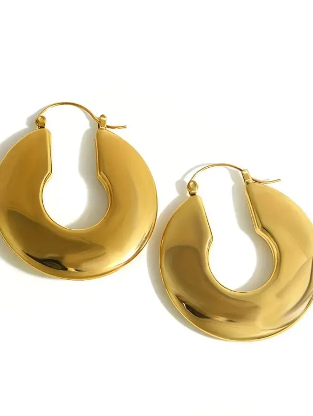 Chucky gold hoop earrings; 1.57